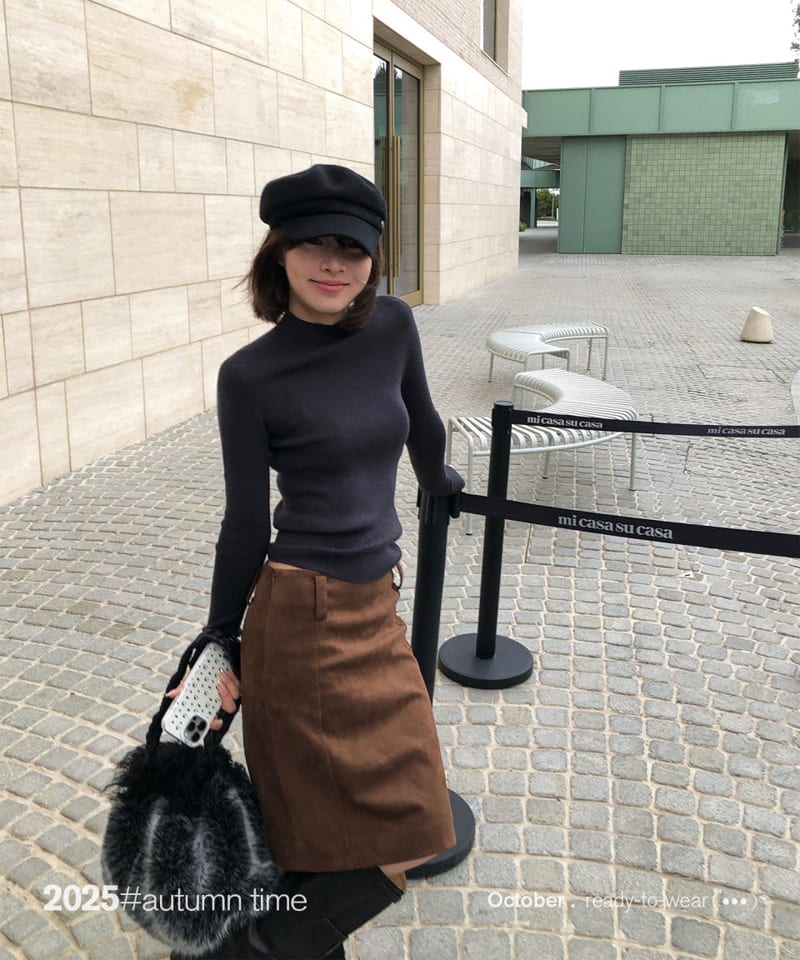 브라운 스웨이드 미디스커트 대표 이미지